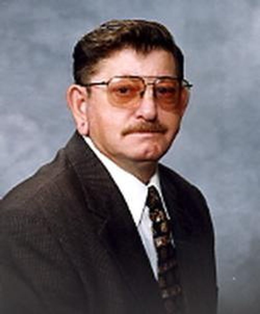 Robert M Charles