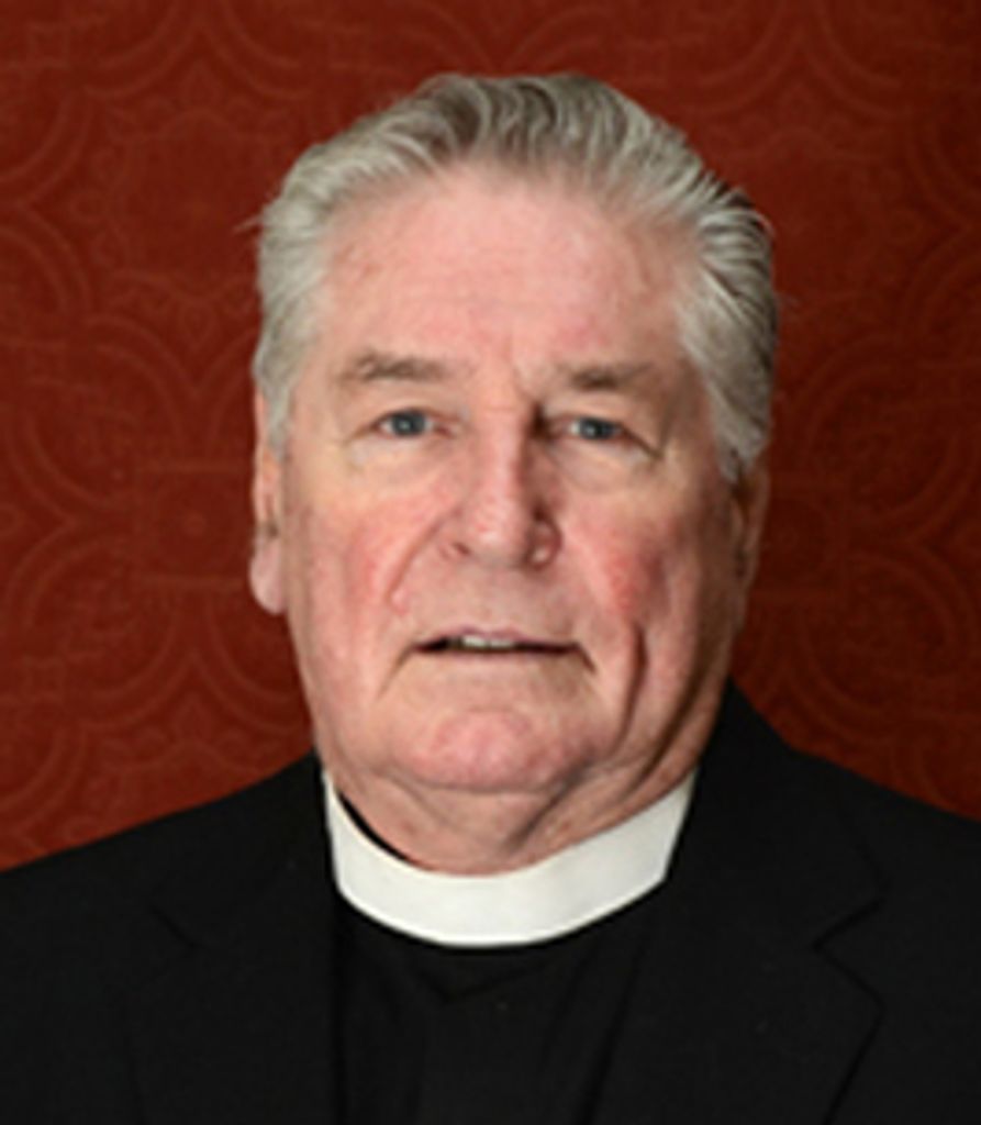 Rev. Msgr. Roger  J. Watts