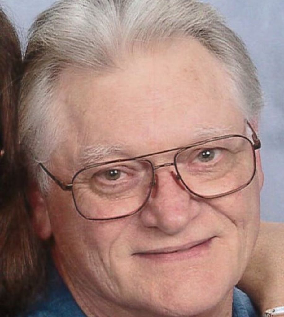 John T. -Lj- Schultheis