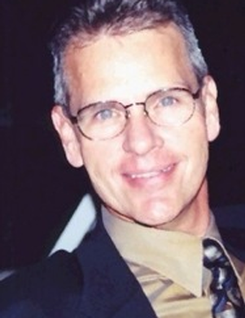 Mark E. Krisher