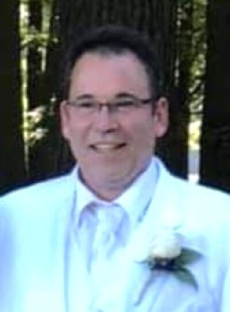 Johnny J. Schneider Profile Photo