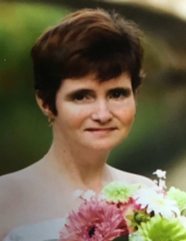 Tina M. Meggison