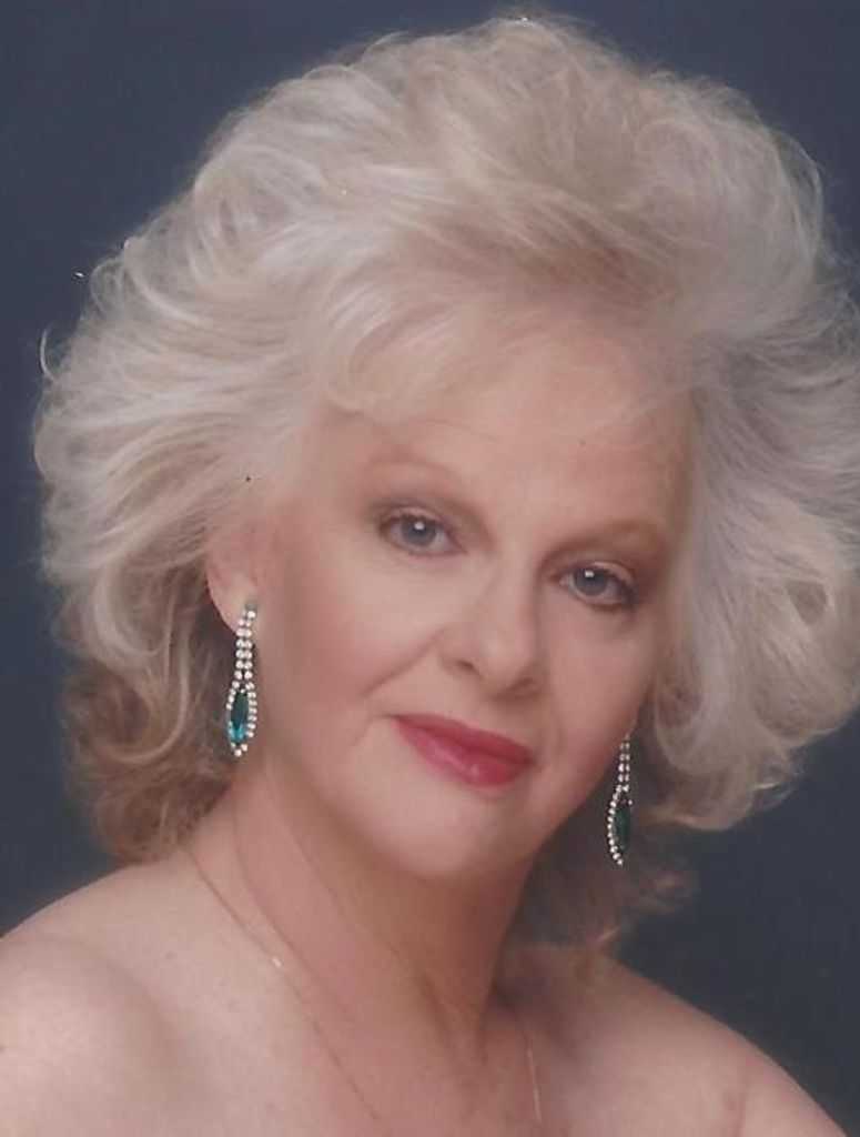 Maggie M. (West)  West