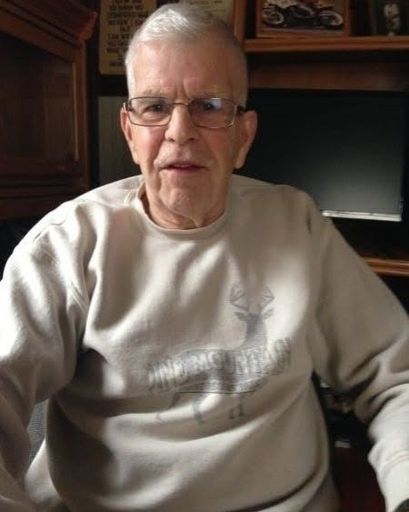 John Eggert Mortland's obituary image