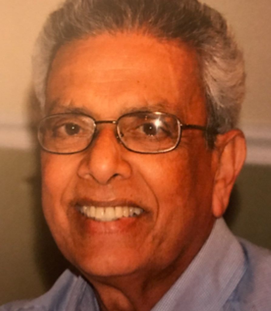 Rev. Ernest  Thayil