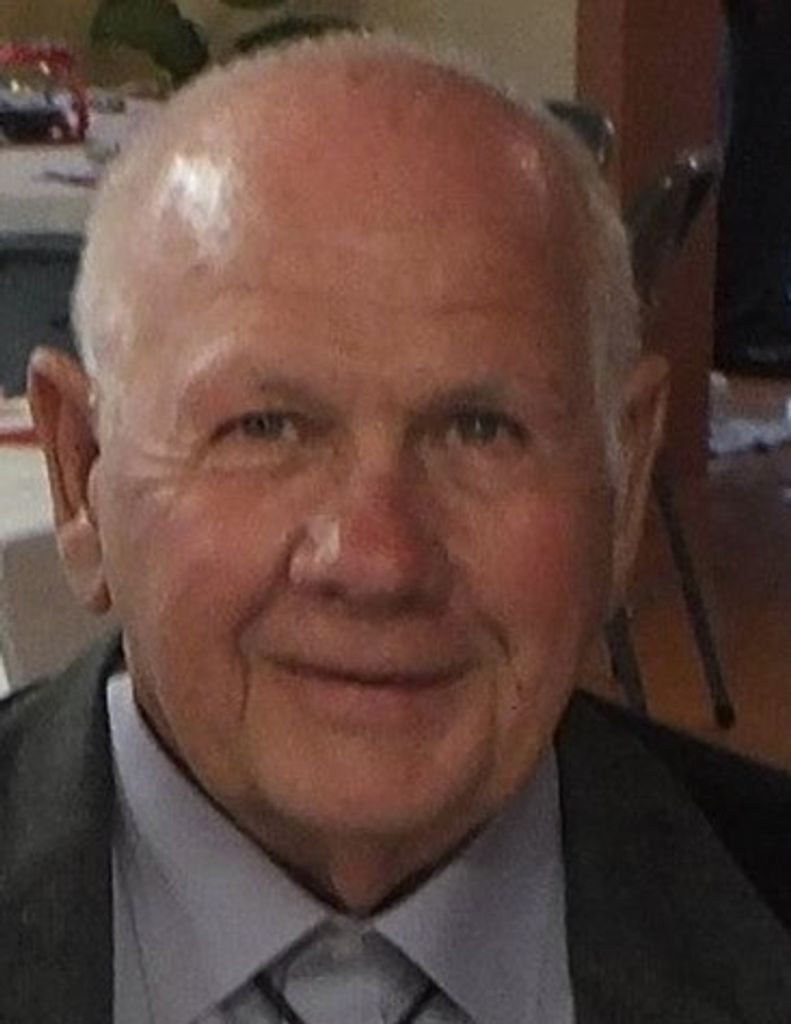 Merrill J Adams