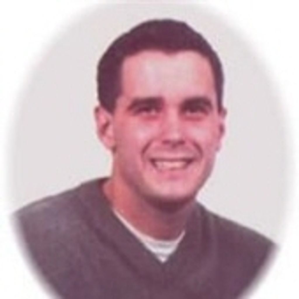 Christopher J. Karau