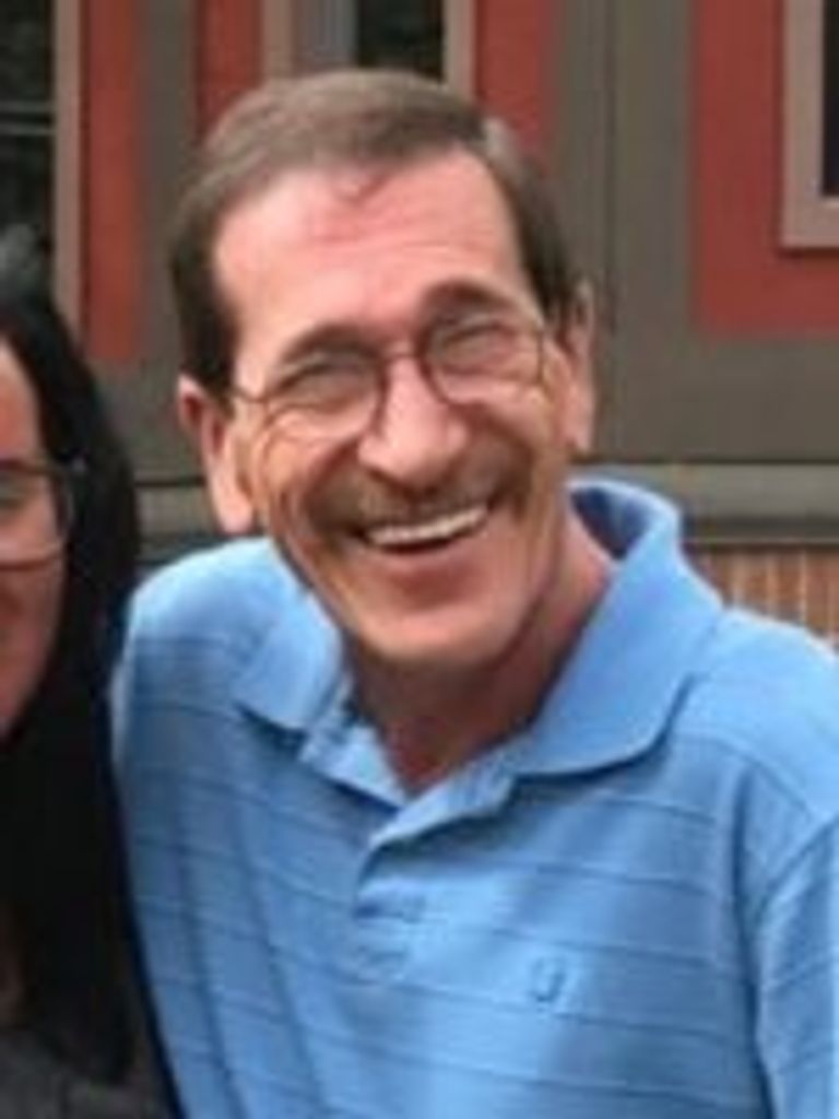 Thomas E. “Tom” Grezlik