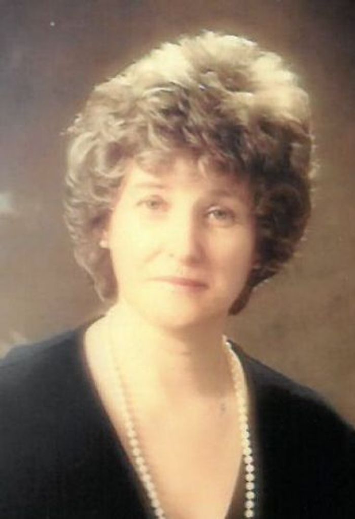 Helen A. Mangei