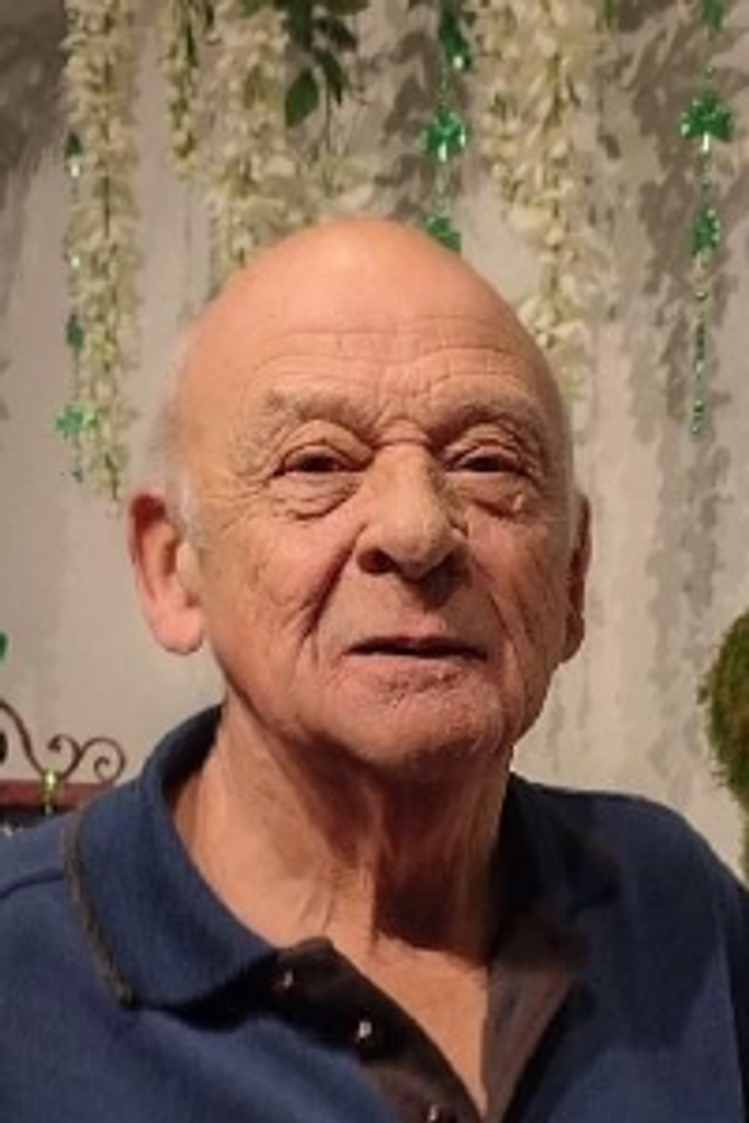 Thomas E. "Tom" Capone