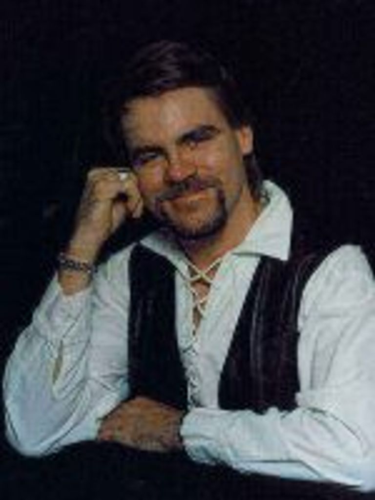 Chris E. Huddleston