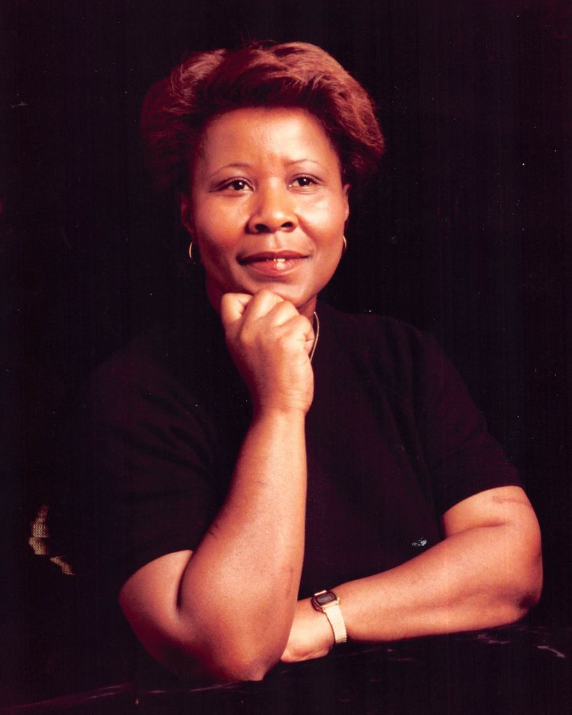 CORA B. COOK