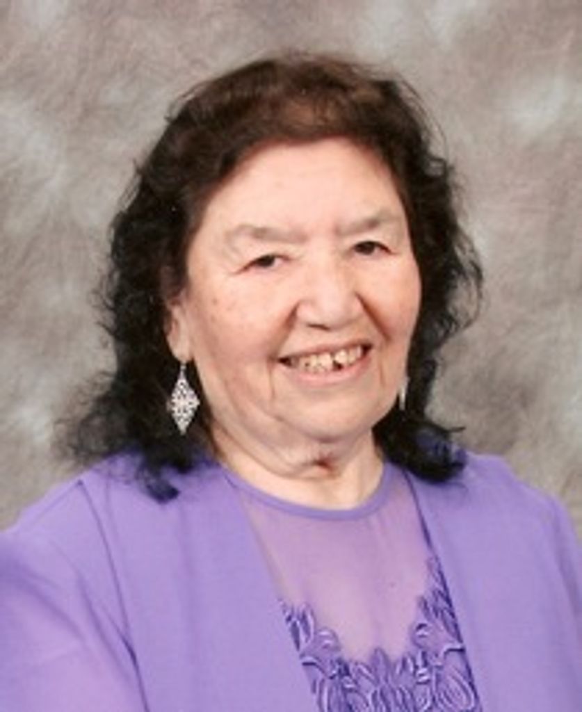 Mary M. (Mendoza)  Flores