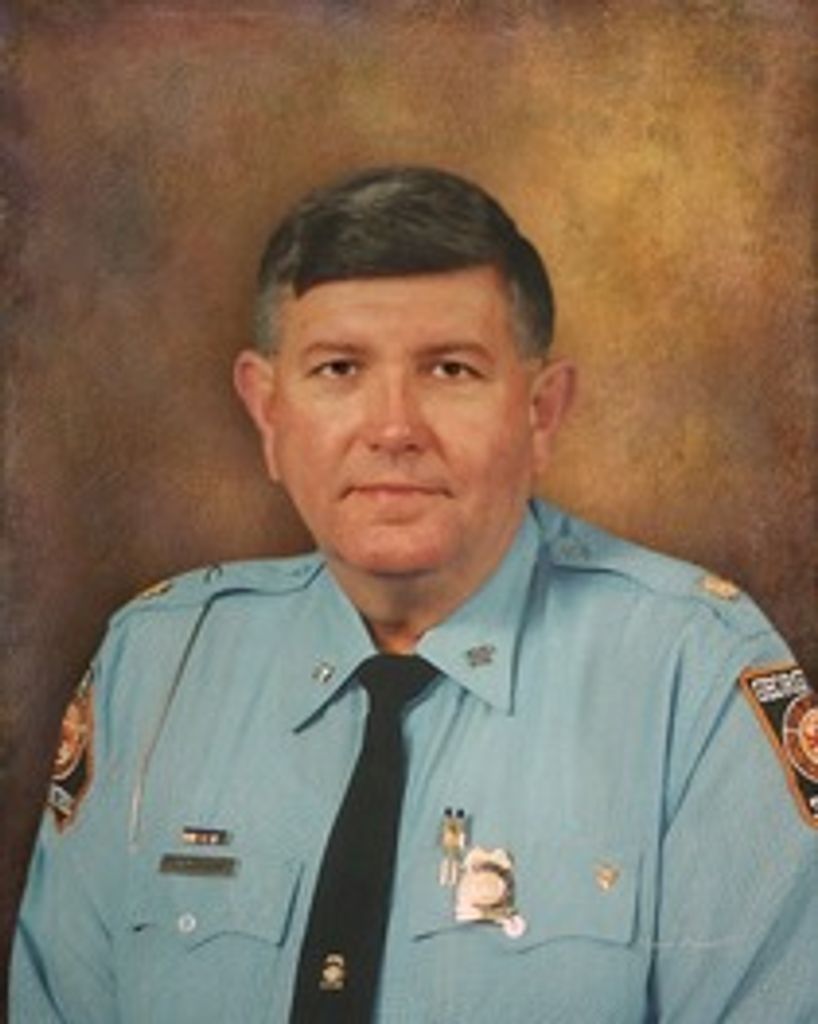 Thomas  E. Tomlinson