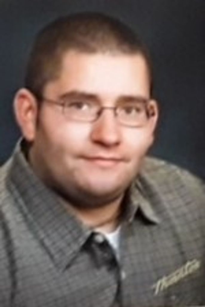 Justin T. Adams