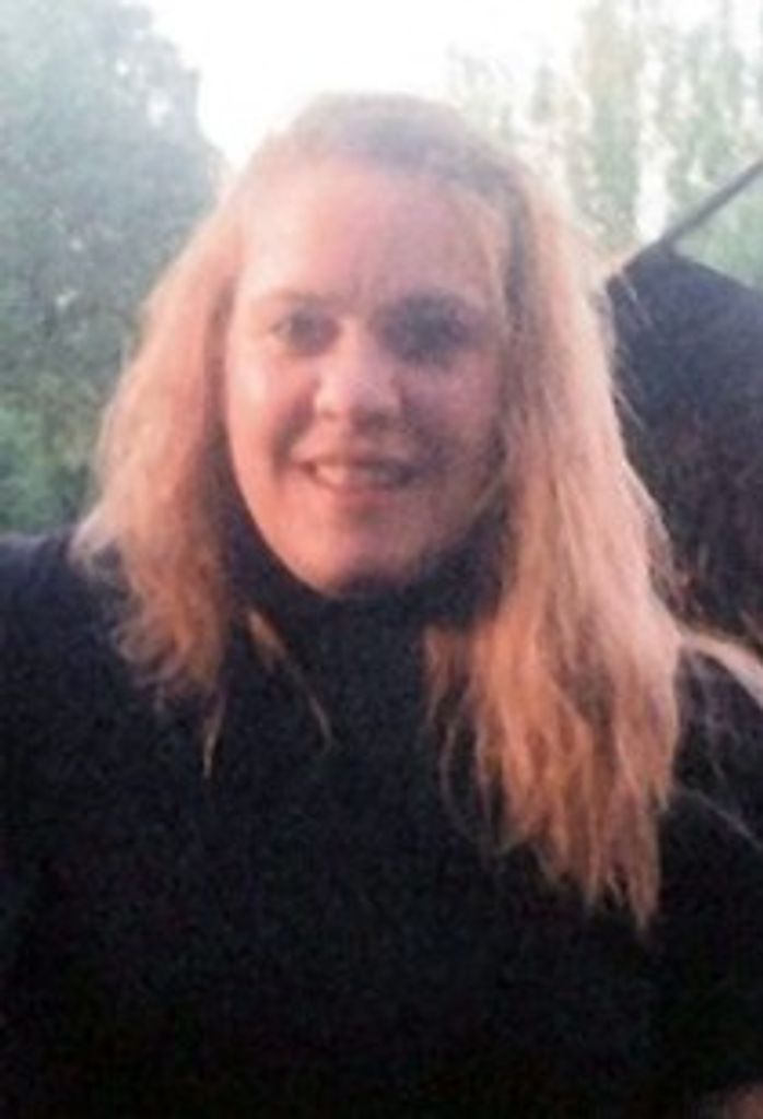 Melissa E. "Missy" Downing