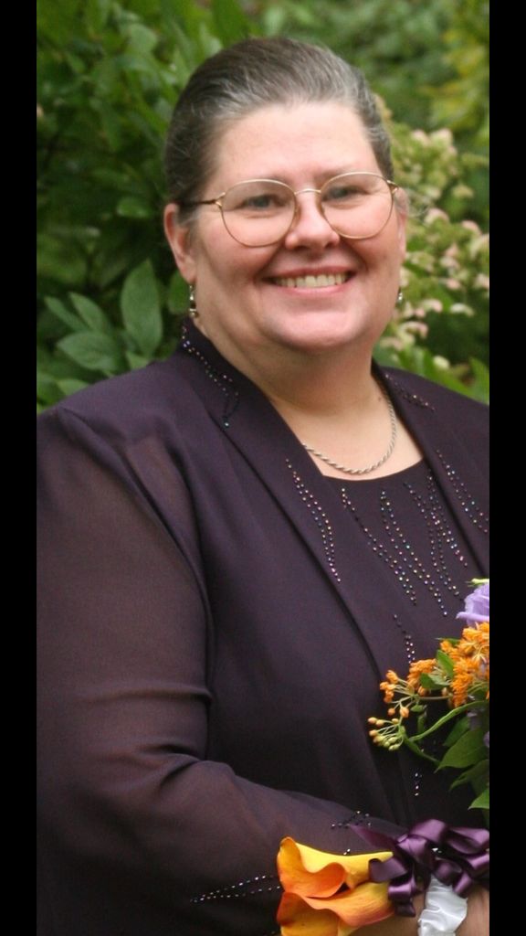 Mary E. “Beth” Holmes