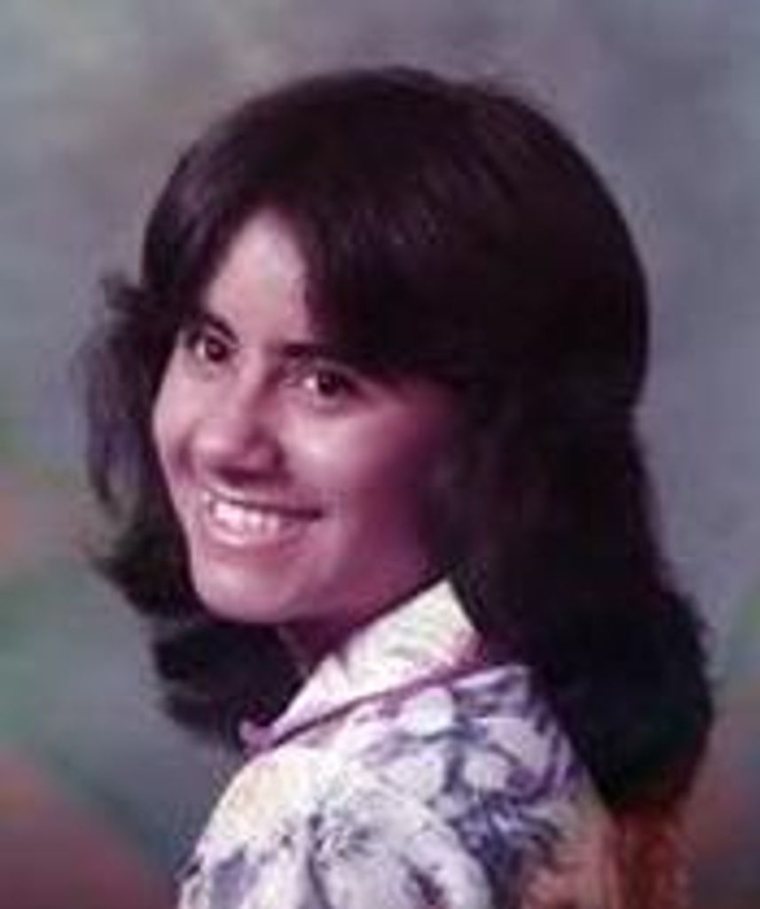 Rosa M. (Muñoz) Smith