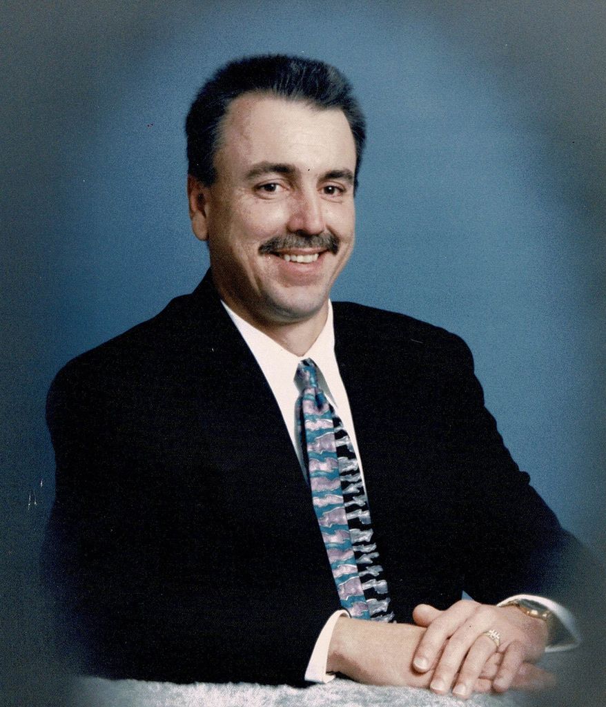 Ernest  Lester “Ernie” Raynor