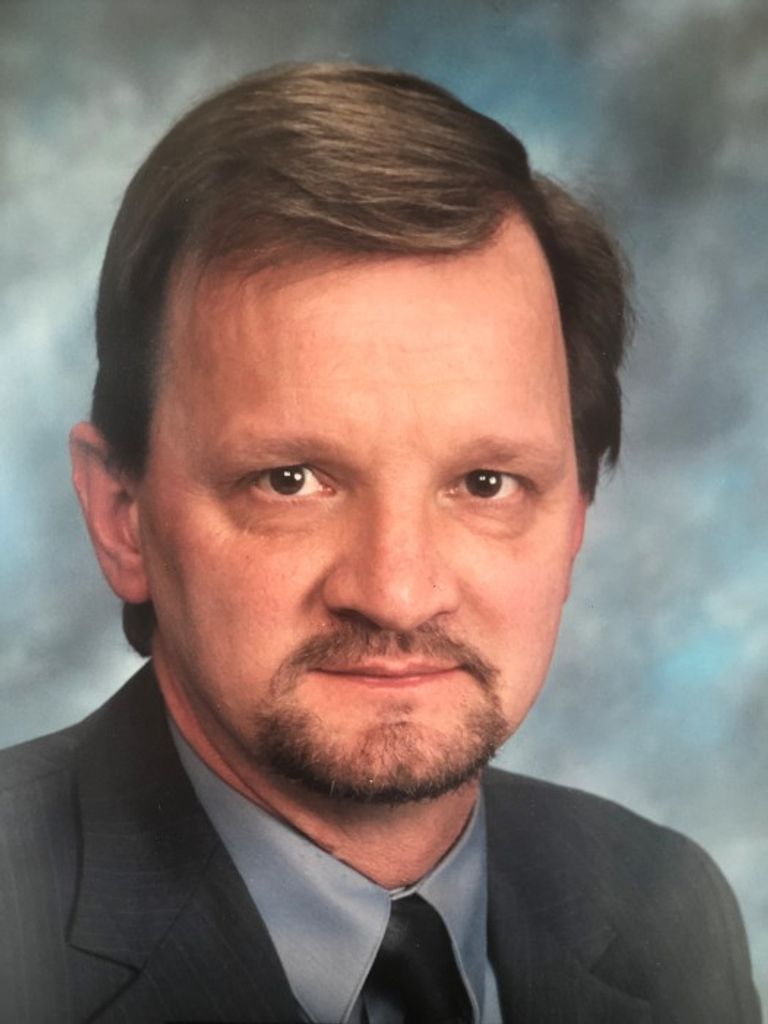 Mark E. Thompson
