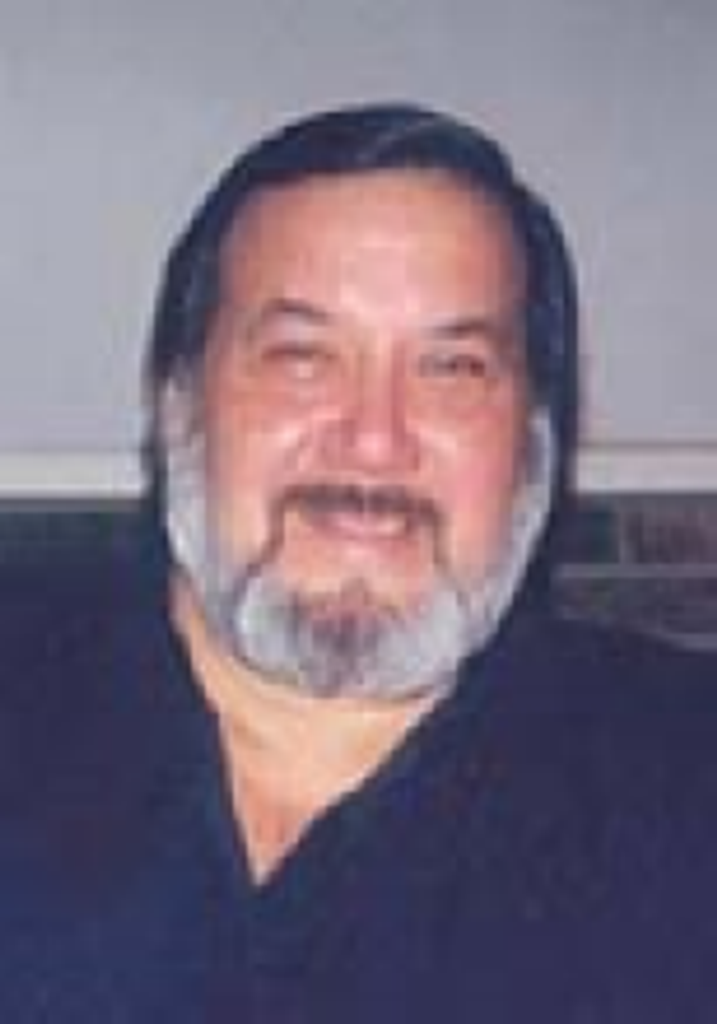 Charles  W. Garza