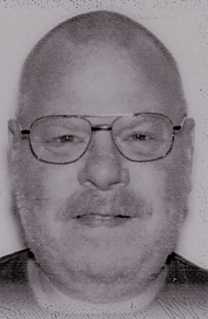 Thomas J. Schrader