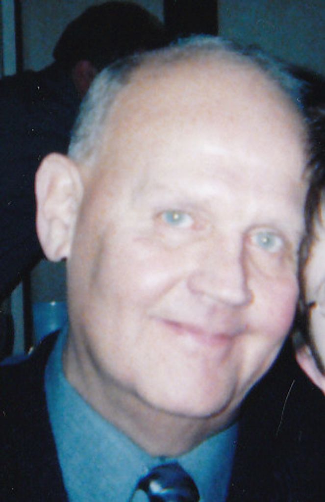 Dennis R. Breza