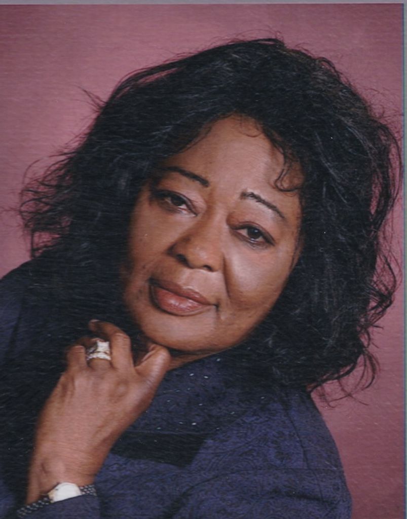 Caroline Equawumi (Kpenosen)  Barrett