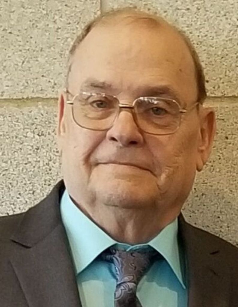 Ronald “Ron” E. Carlyle