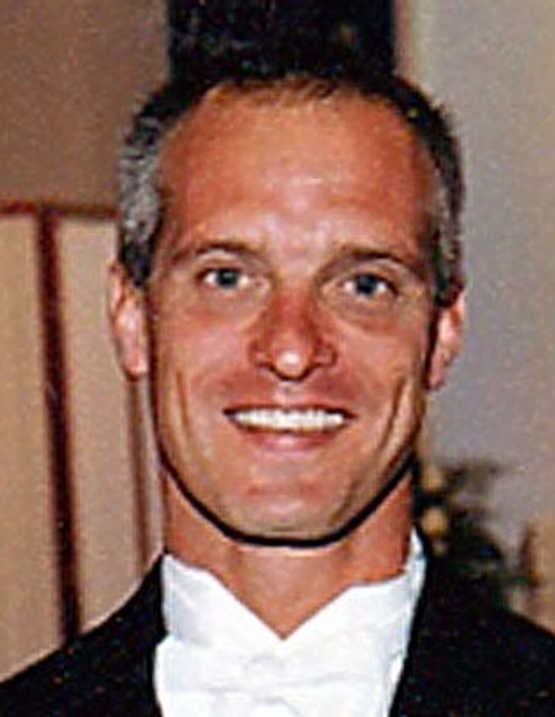 Mark E. Tacsik