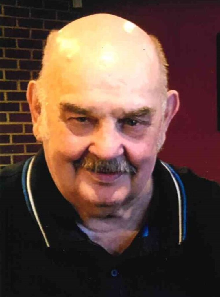 Raymond E. "Snoz" Guillozet