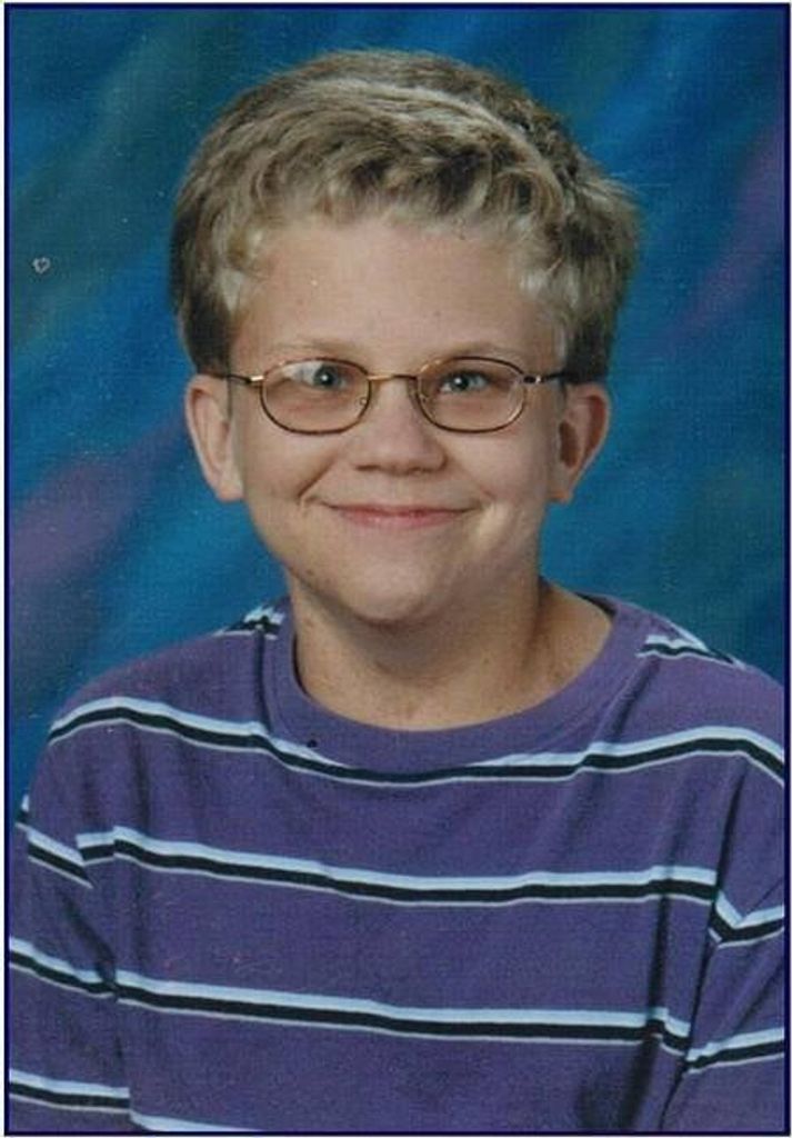 Dustin E. Leeper