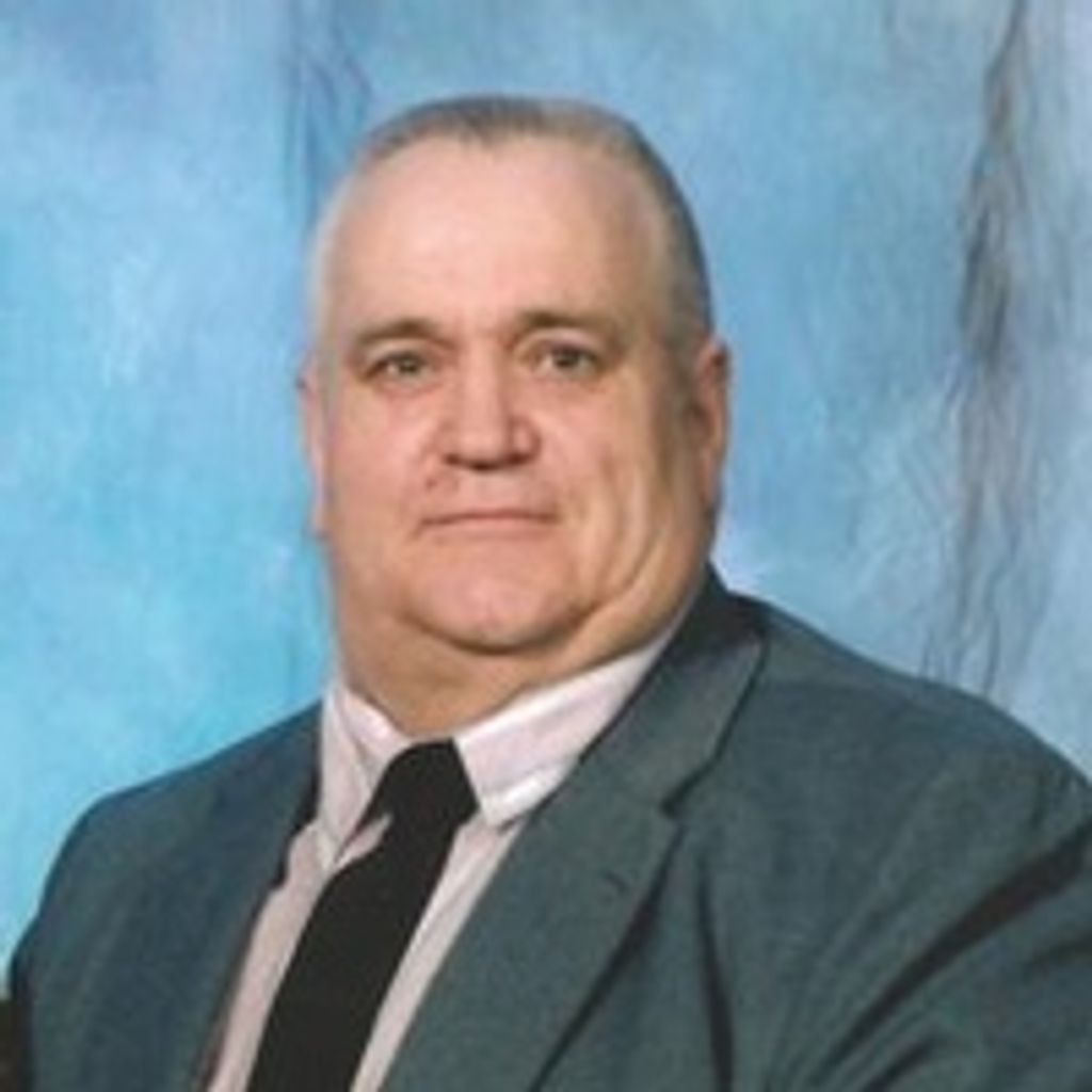 JOHN B. OXTON
