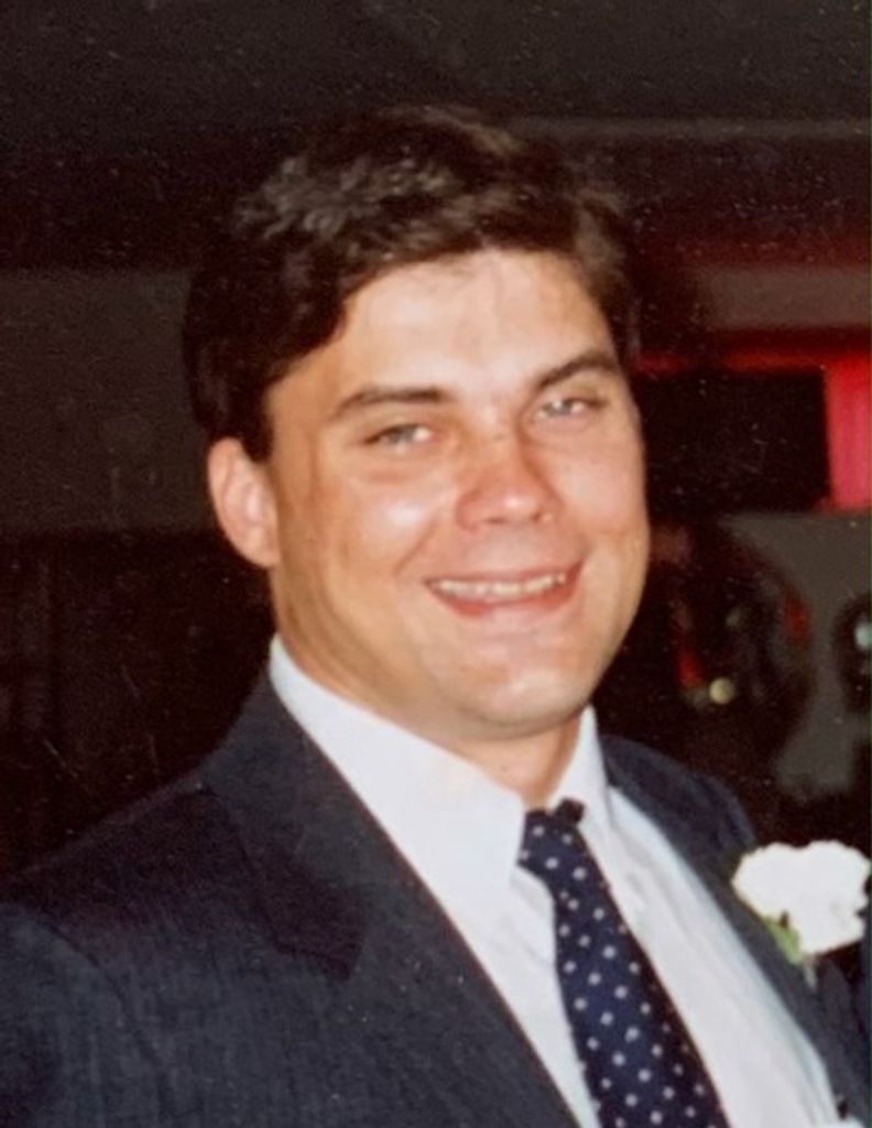 Mark L. Wiencek