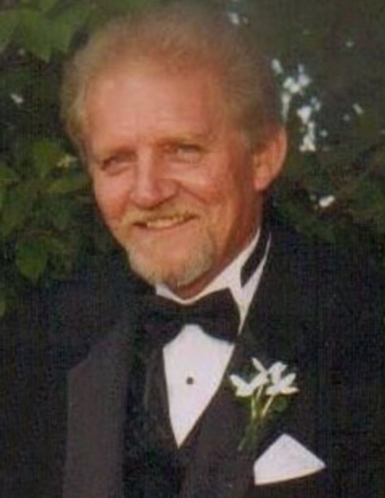Thomas E.  Miller