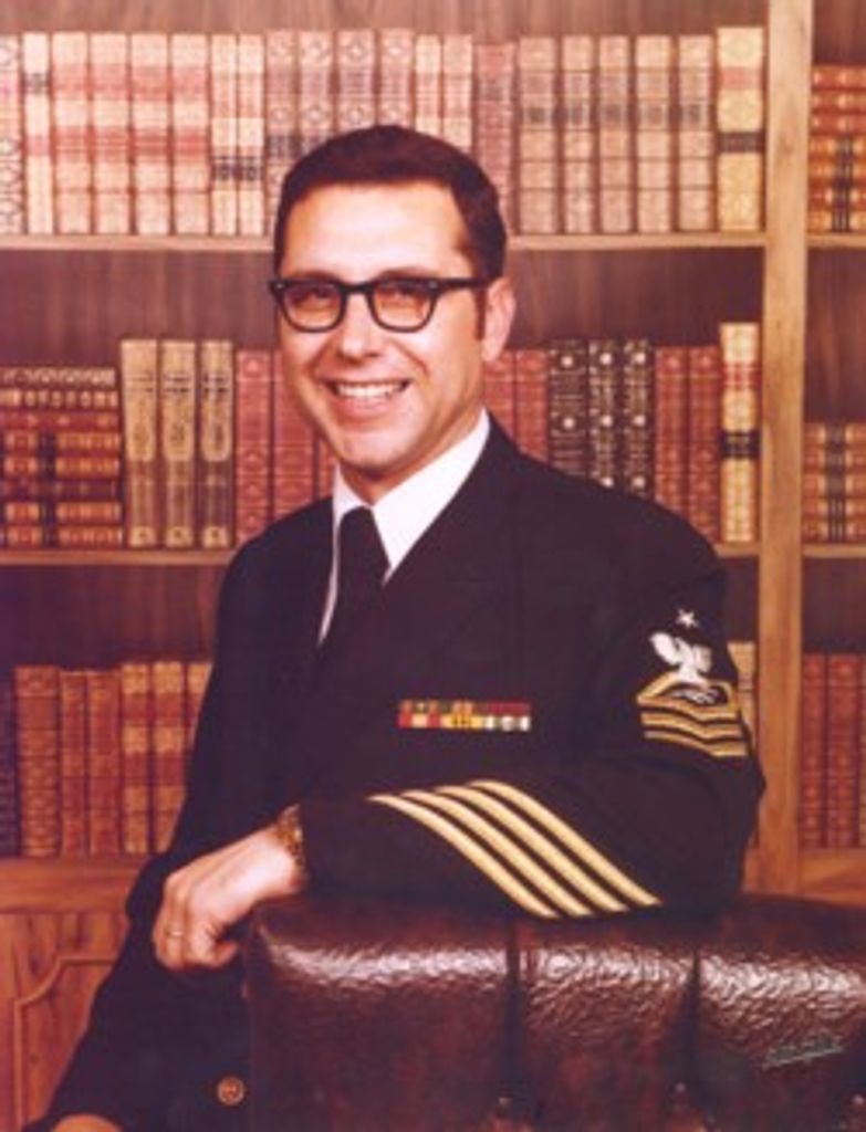 John  E. Manos