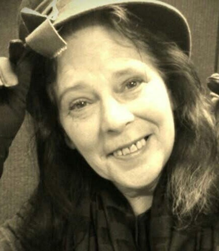 Janine M. Miely