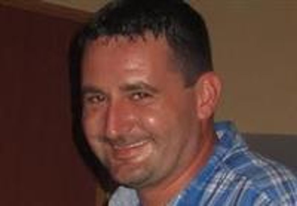 Derek J Downs