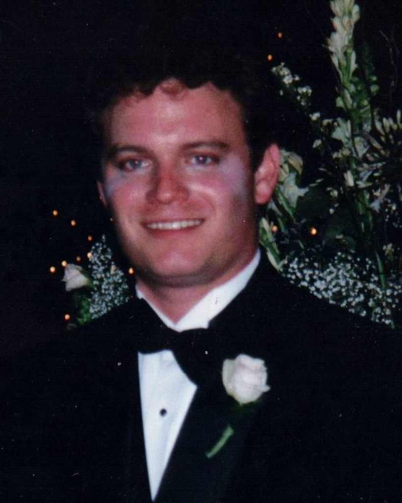Russell Davis Menard Profile Photo