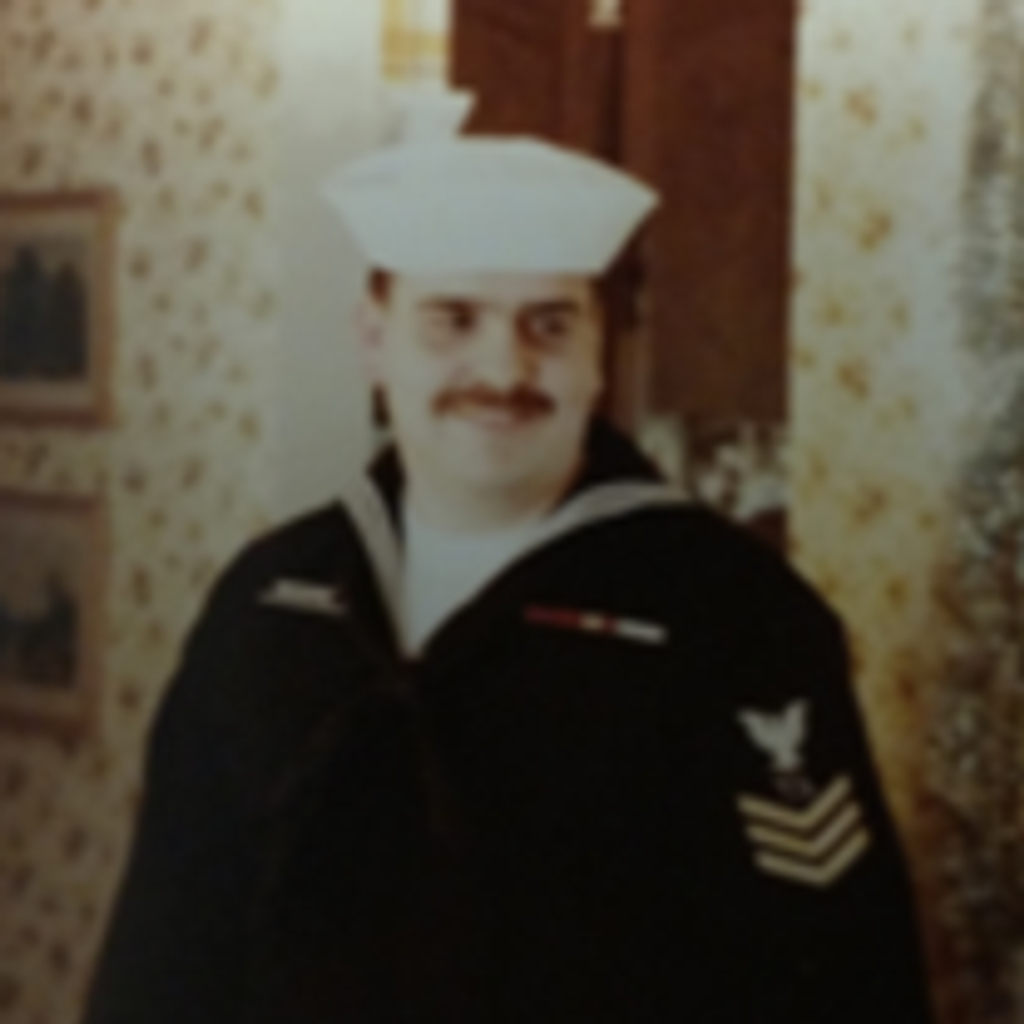 Kenny L. Moore