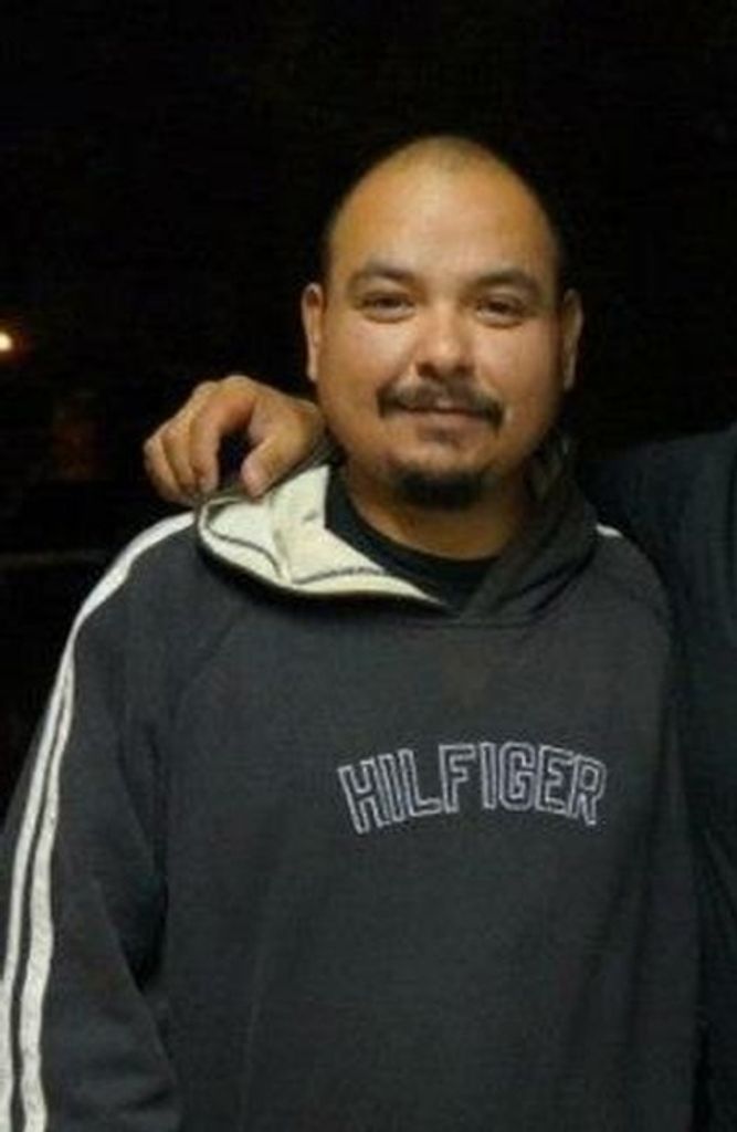 Mr. Enrique 'Rick' Flores