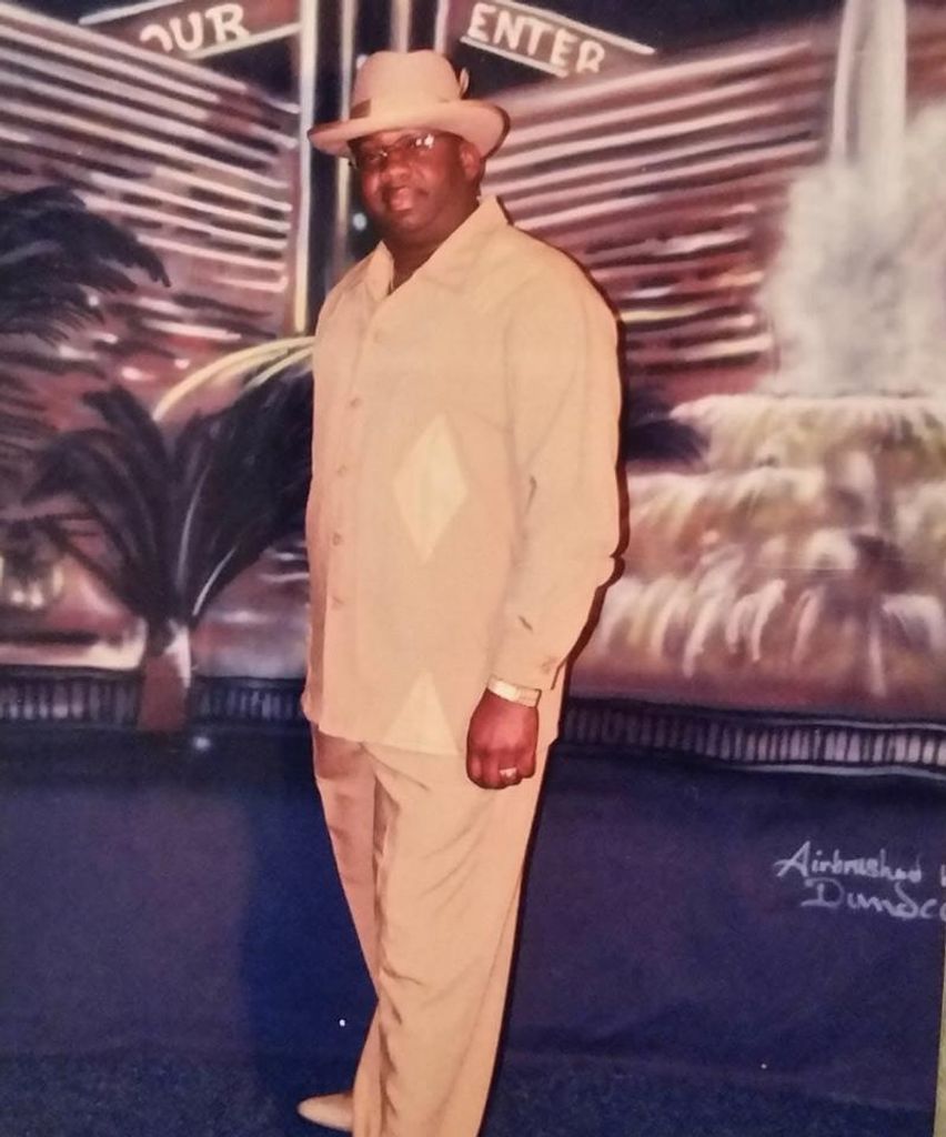 Mr. Reginald "Cat Daddy" Bates