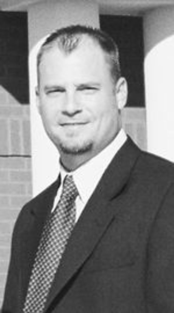 Anthony J. Komer