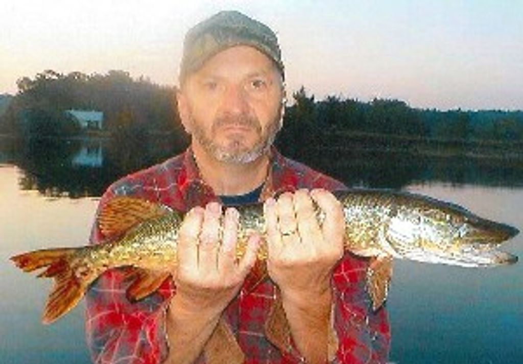 Mark D. “Mo” Adams