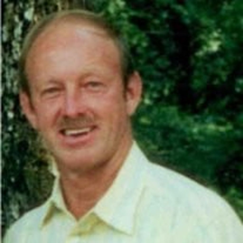 Mr. Neil Powell Uzzle