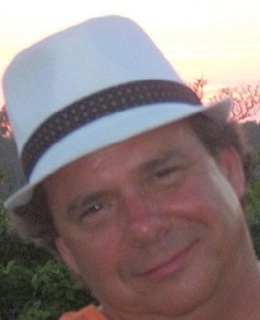 Mark E.  Dionne