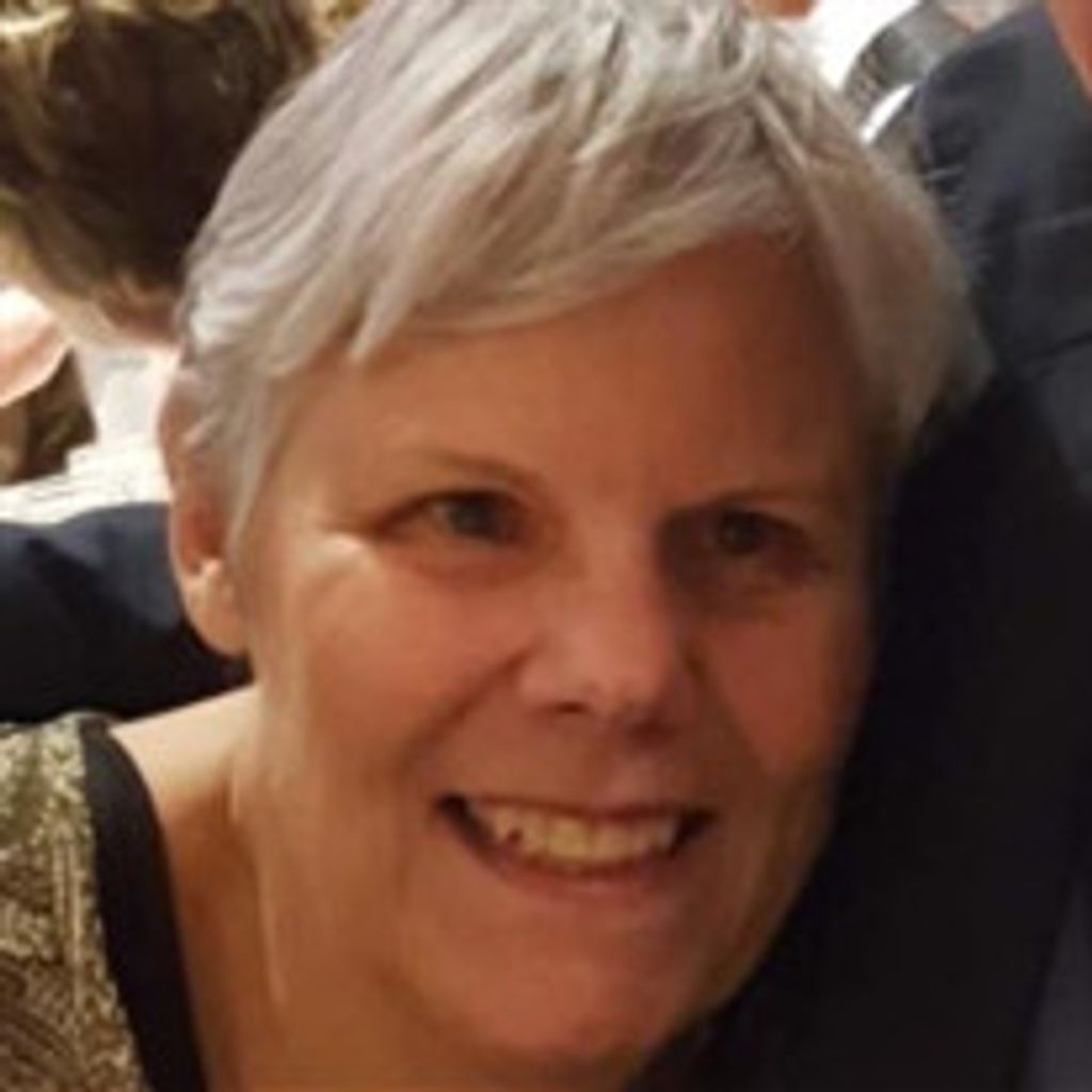 Kristine M. De Broux