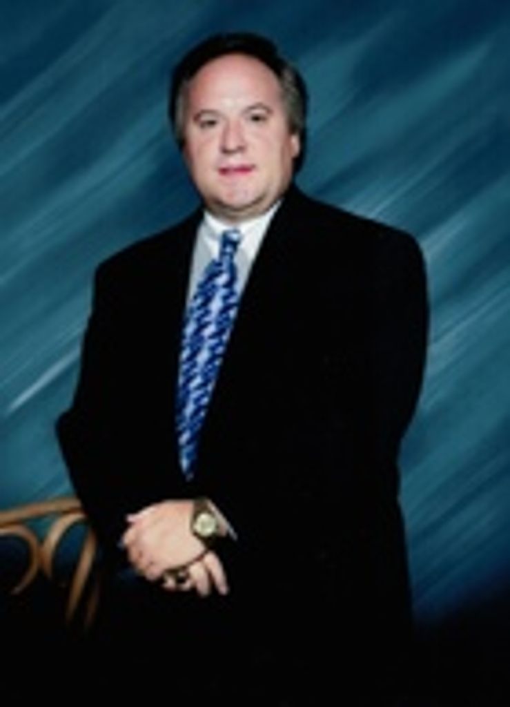 Reggie  Belk  Sr.