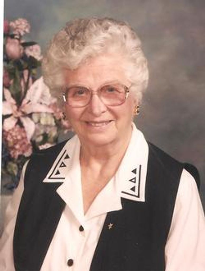 Margaret E. " Marge " Justus