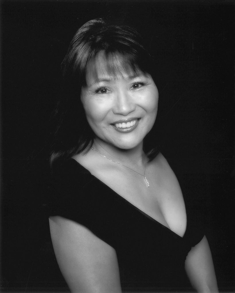 Kum Sun "Tina" Witcher